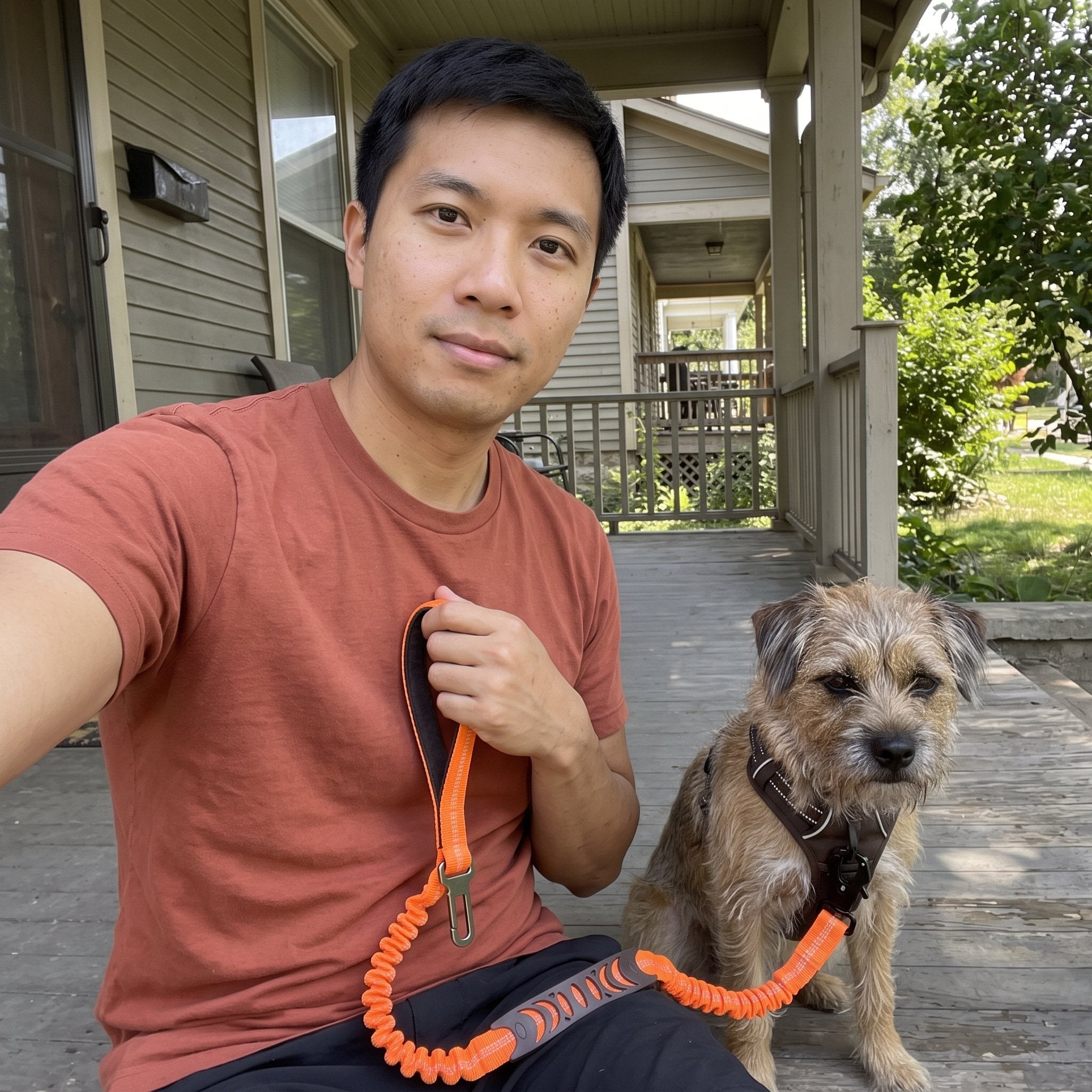 Daniel K. with a dog and Trailkind leash outdoors